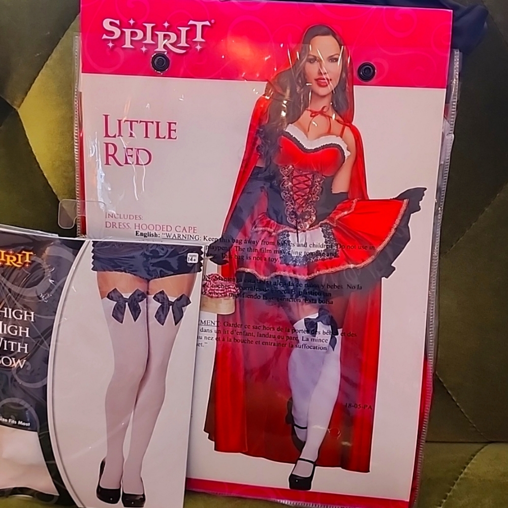 Spirit Halloween Little Red costume includes dress hood and separate tights